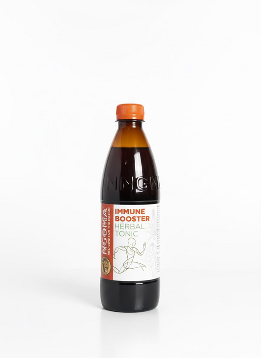 Bottle of Noma Immune Booster Herbal Tonic on a dark background
